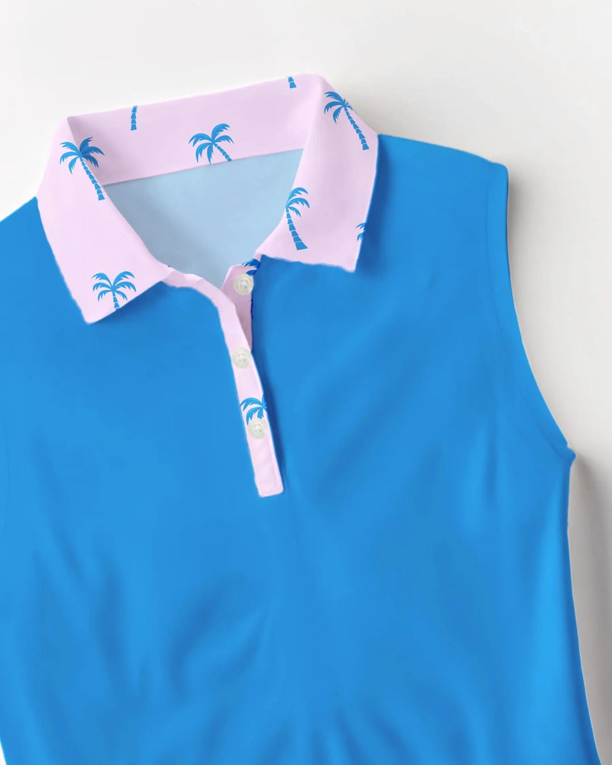 women's sleeveless golf polo in Palm Tree Pink print - fabric closeup front view
