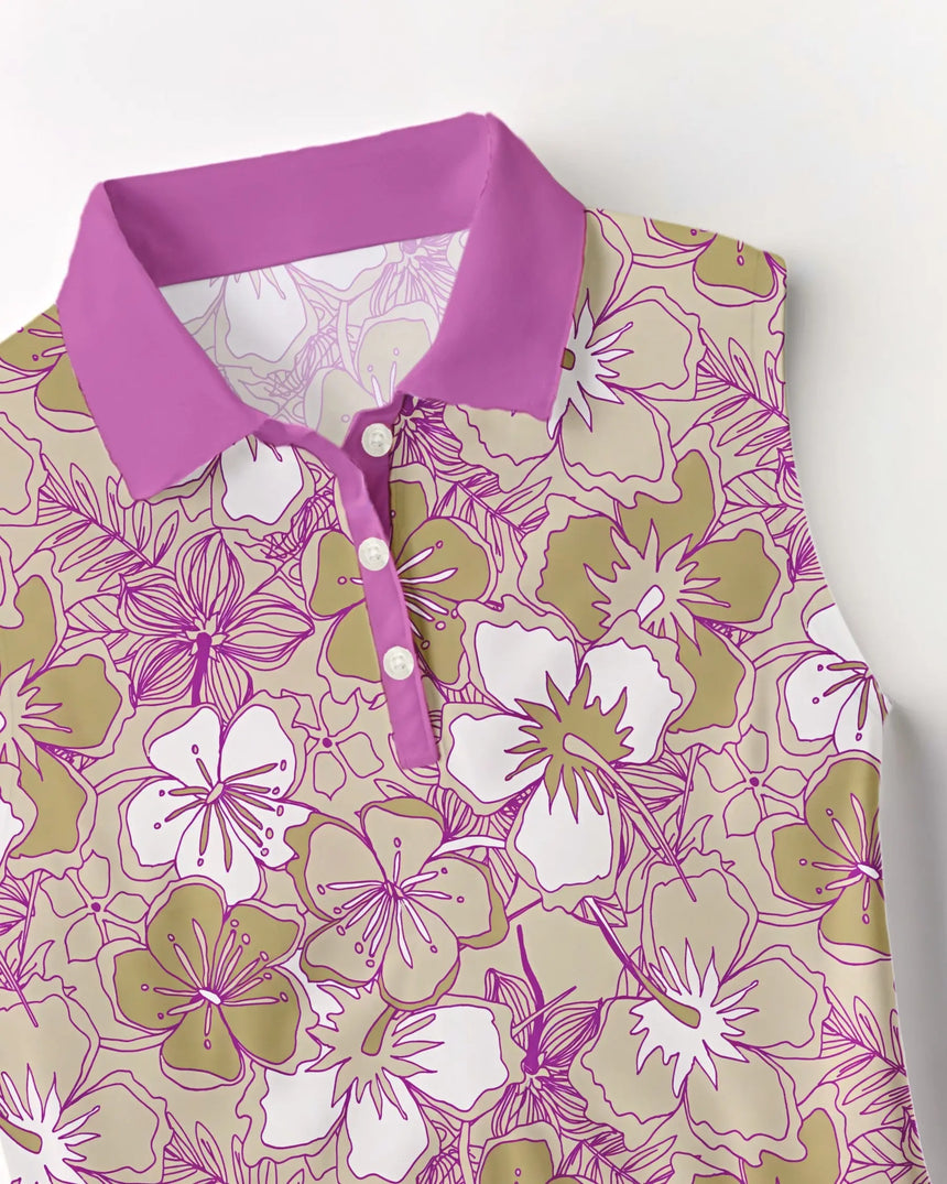 women's sleeveless golf polo in Blossom Breeze print - fabric closeup front view