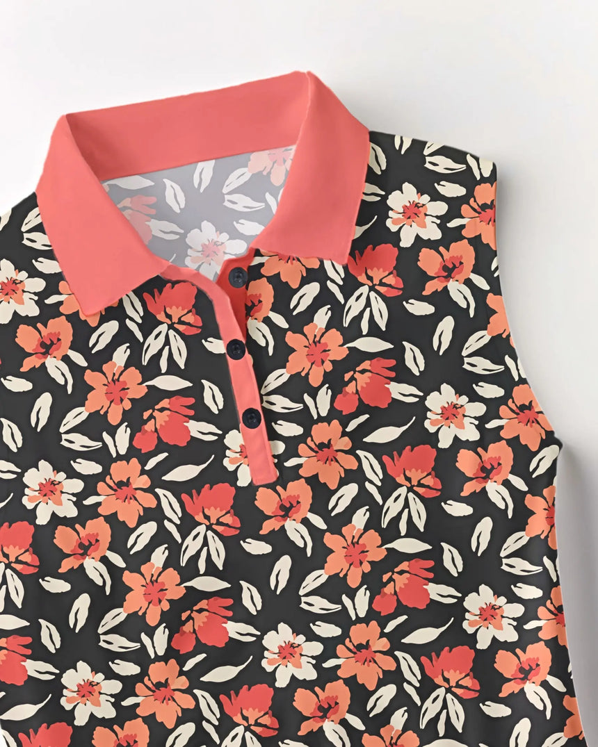 women's sleeveless golf polo in Coral Swing Floral print - fabric closeup front view