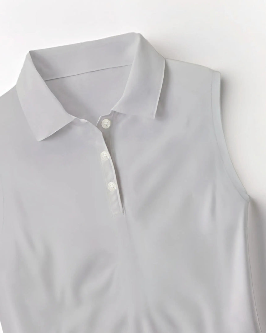 women's sleeveless golf polo in Eagle Elegance print - fabric closeup front view