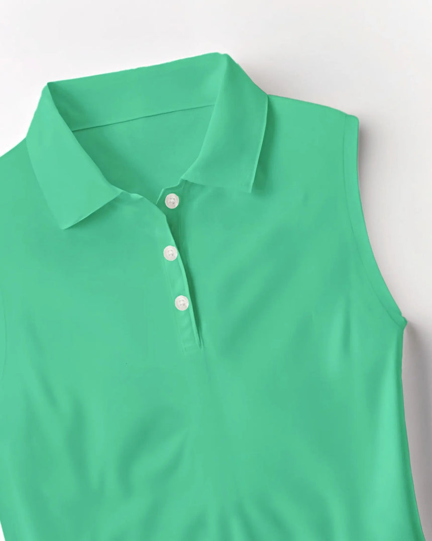 women's sleeveless golf polo in Fairway Fronds print - fabric closeup front view