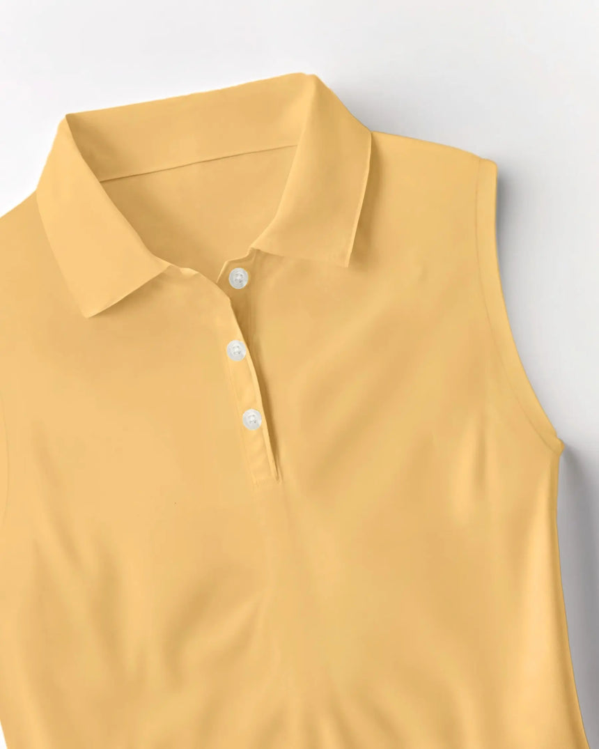 women's sleeveless golf polo in Sunset Swing print - fabric closeup front view