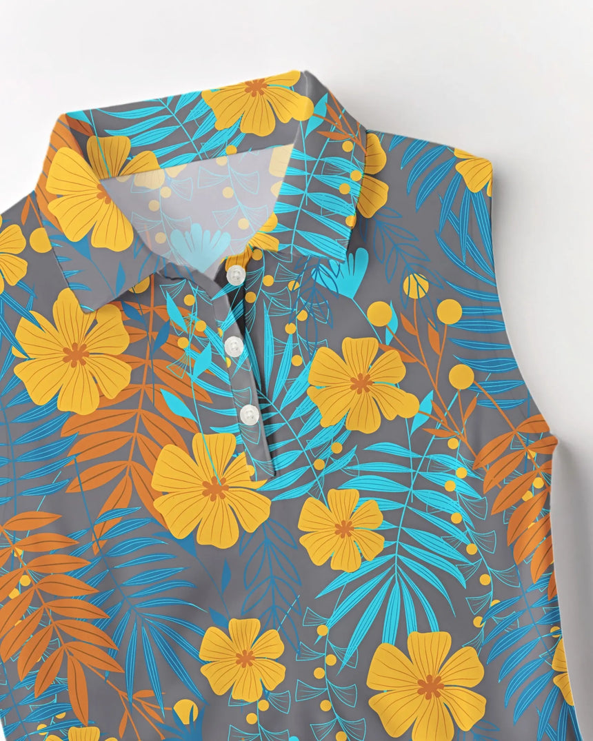 women's sleeveless golf polo in Tropical Mirage print - fabric closeup front view