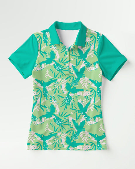 Green and white tropical print short sleeve polo shirt on a white background