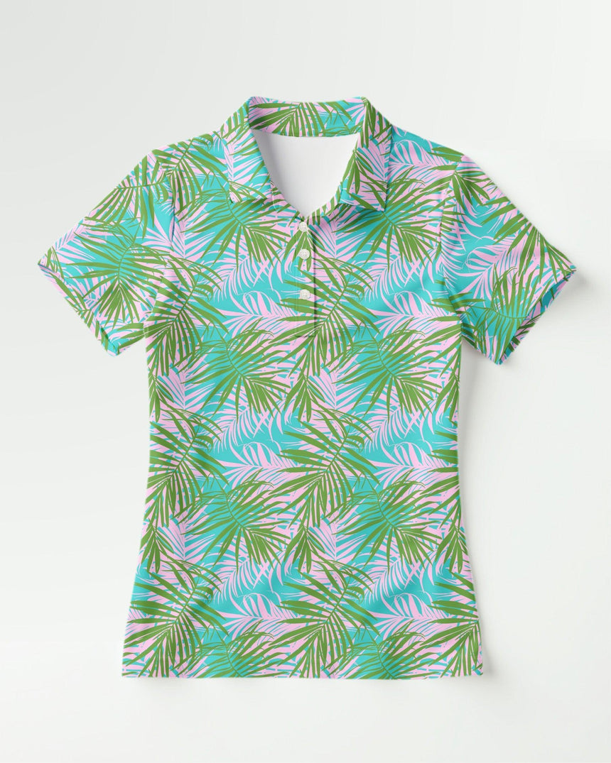 Pink and green short-sleeve golf polo shirt with a tropical leaf pattern on a white background