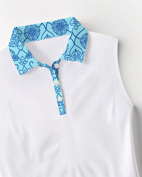 White sleeveless golf polo with blue floral collar and placket details