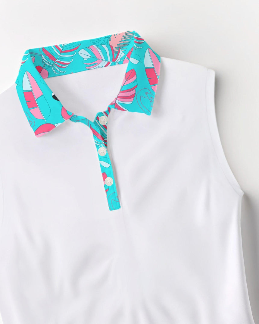 White sleeveless top with a colorful tropical leaf collar on a light gray background