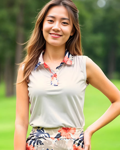 Woman standing outdoors with a blurred green background