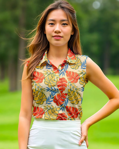 Woman wearing a sleeveless top with colorful leaf pattern outdoors