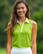 Woman wearing a green sleeveless top with a blurred green background