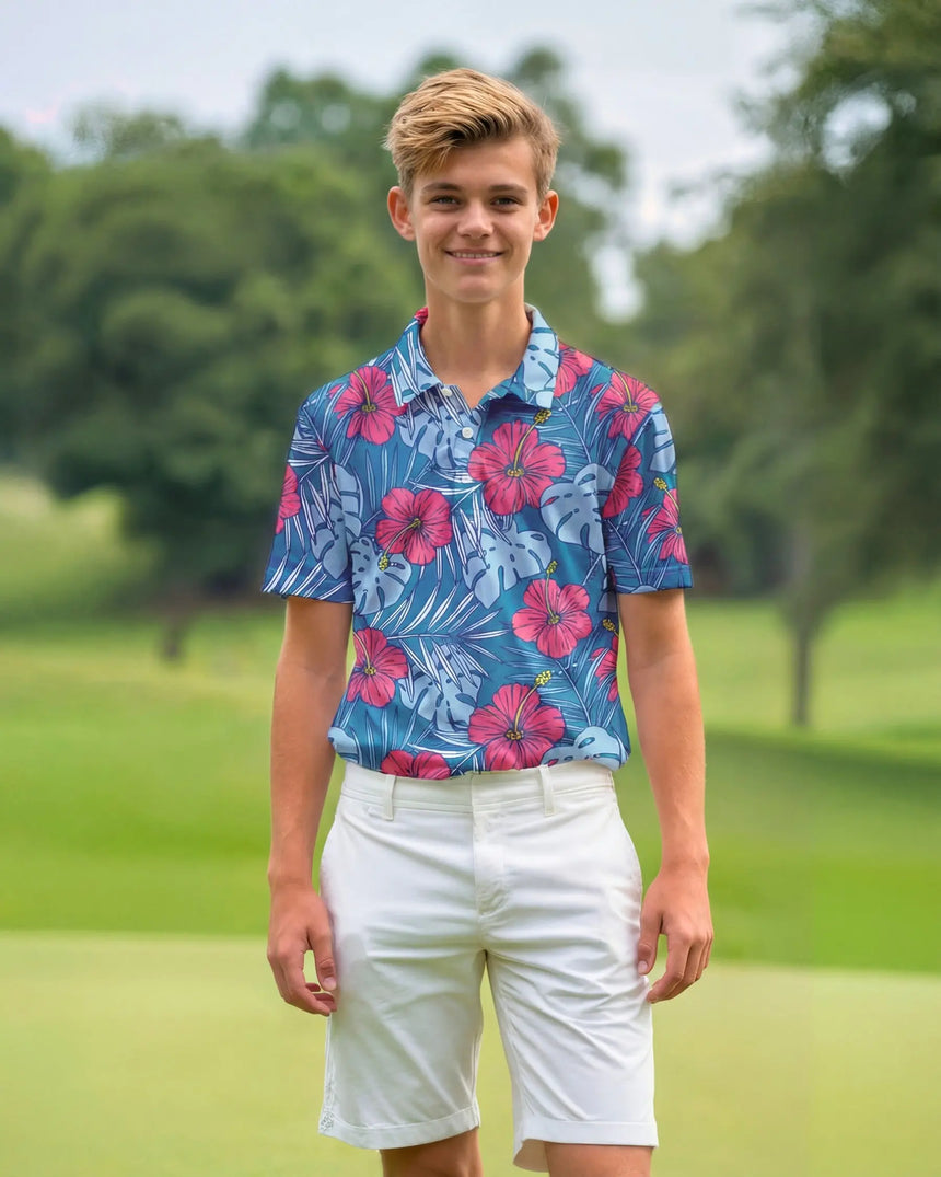 youth short sleeve golf polo in Aloha Bloom print - model wearing on course