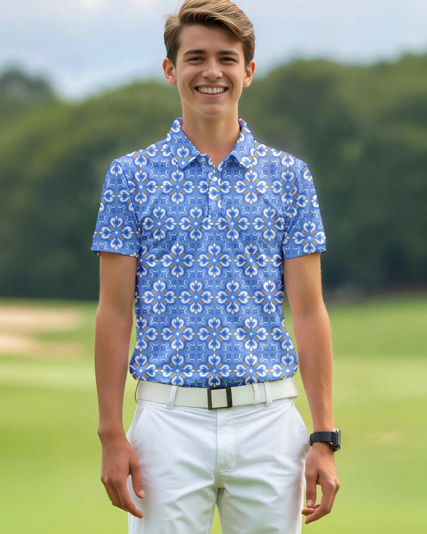 youth short sleeve golf polo in Blue Mosaic print - model wearing on course