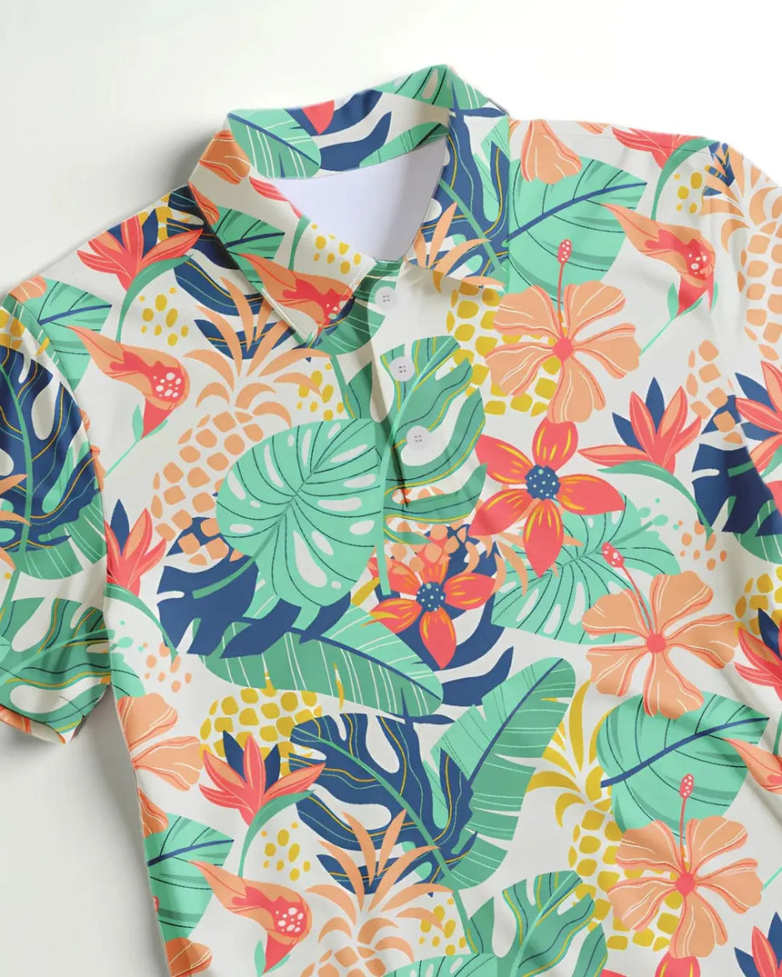 youth short sleeve golf polo in Tee Time Tropic print - fabric closeup front view