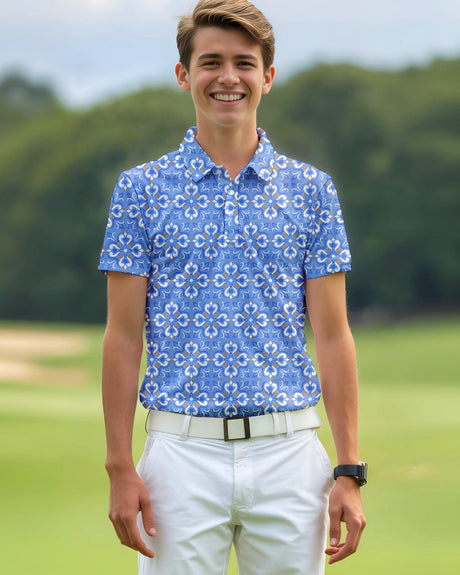 Teenage boy wearing a blue patterned polo shirt on a golf course