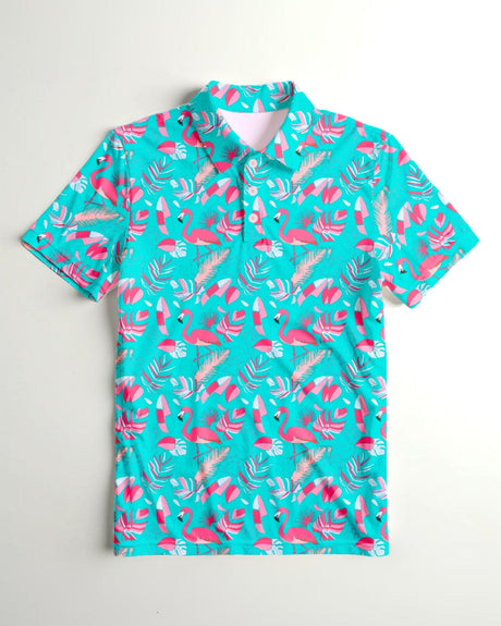 Turquoise polo shirt with pink flamingo and leaf pattern on a white background