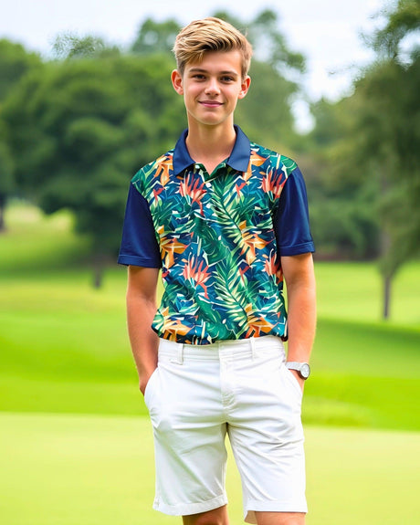 Teenager wearing a colorful tropical polo shirt and white shorts on a golf course