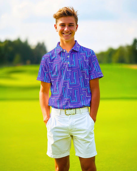 Teenage boy wearing a purple patterned shirt and white shorts on a golf course
